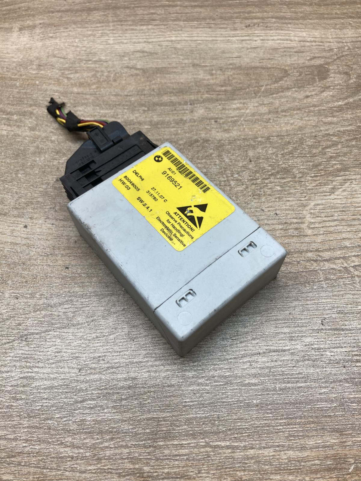 9169521 315780  Center console control module BMW 5 E60 E61