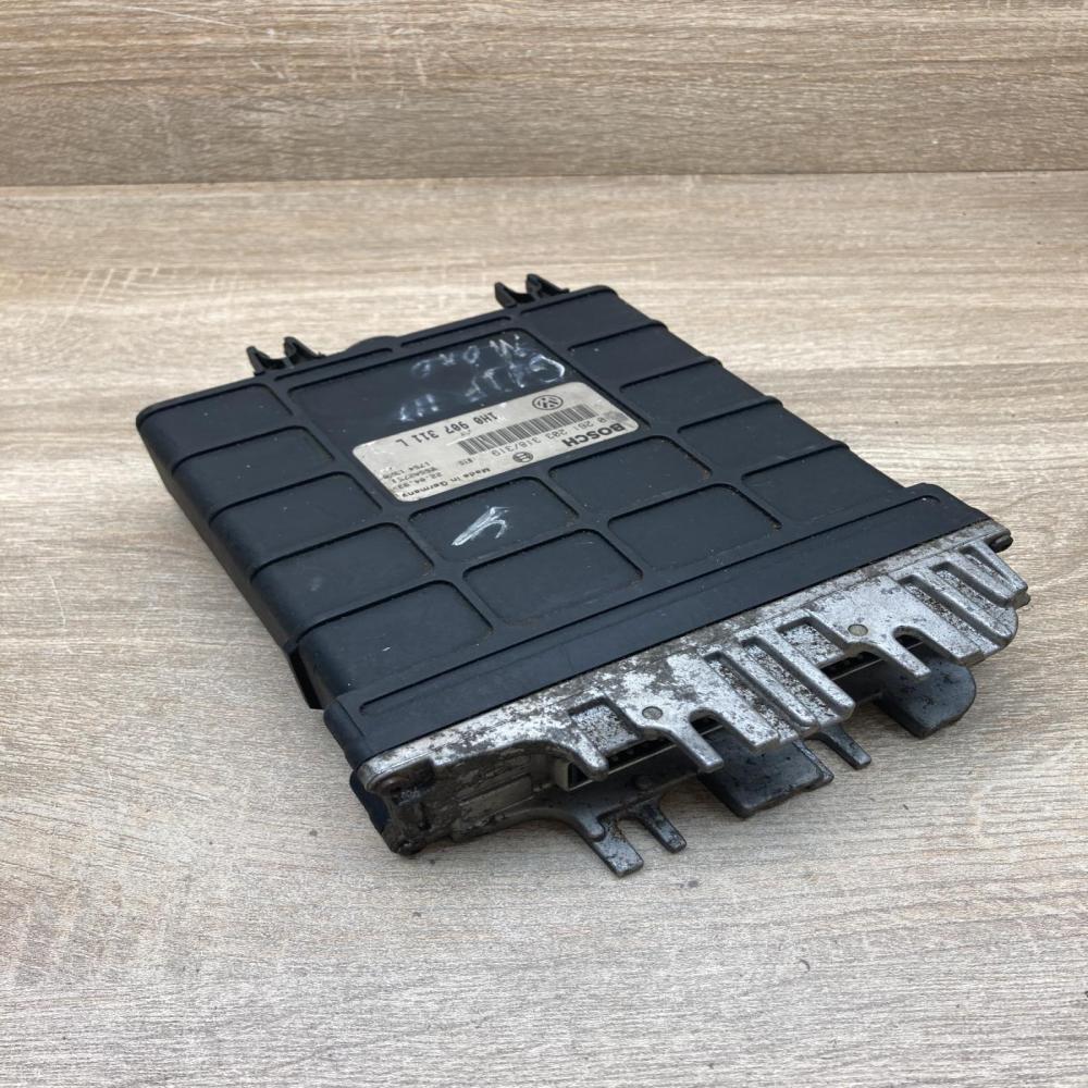 1H0907311L 0261203318  Engine control unit/module ECU Volkswagen Golf III