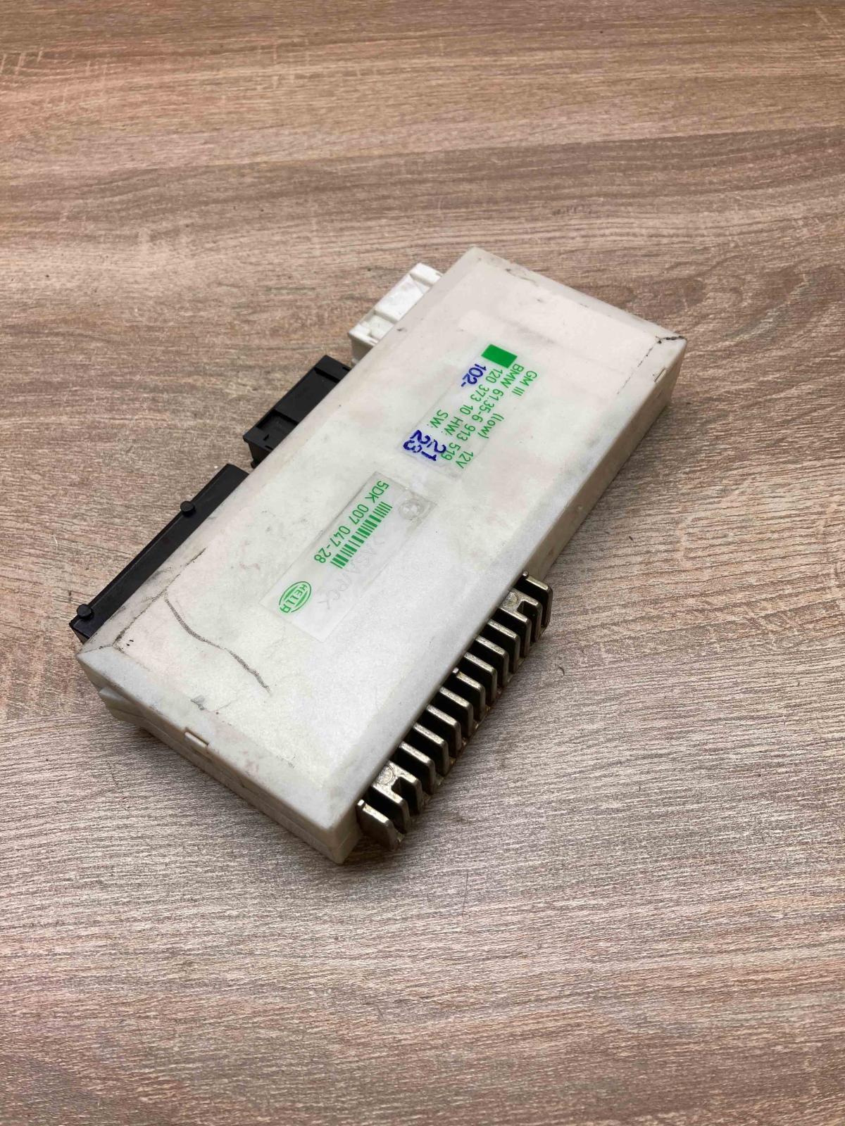 6913519 5DK007047  Central body control module BMW 5 E39