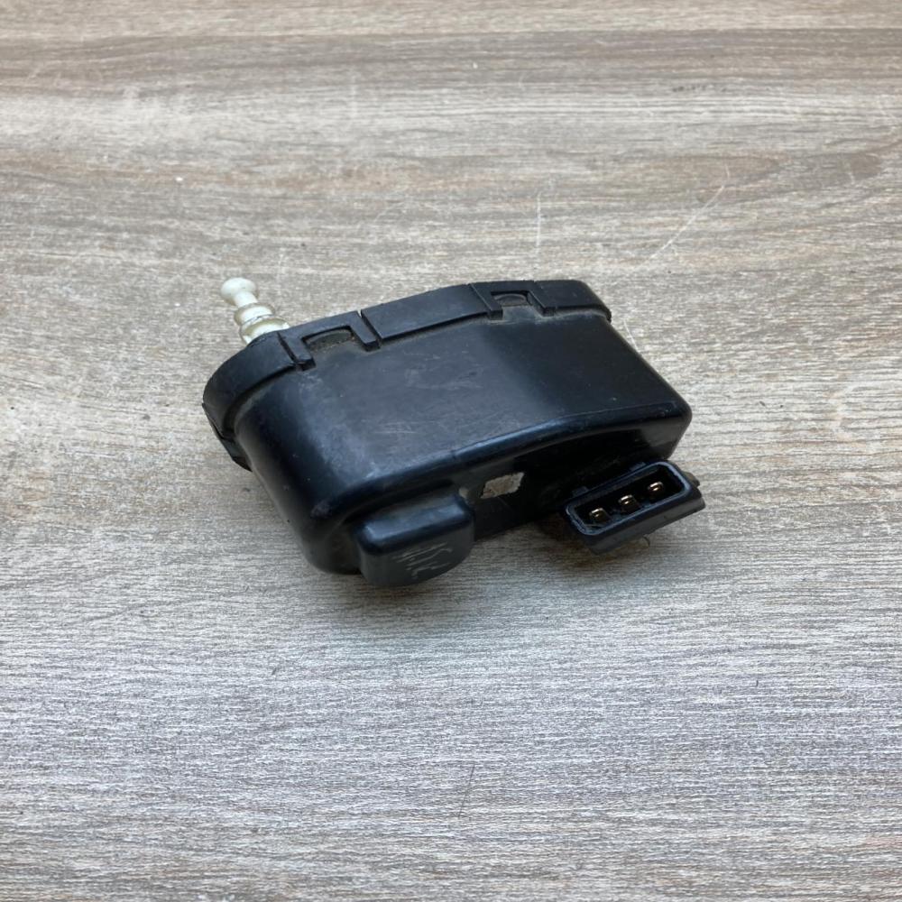 1H0941295 004375  Headlight level adjustment motor Volkswagen Golf III