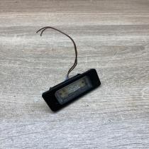 7193293 103341723  Trunk door license plate light bar BMW 1 E81 E87