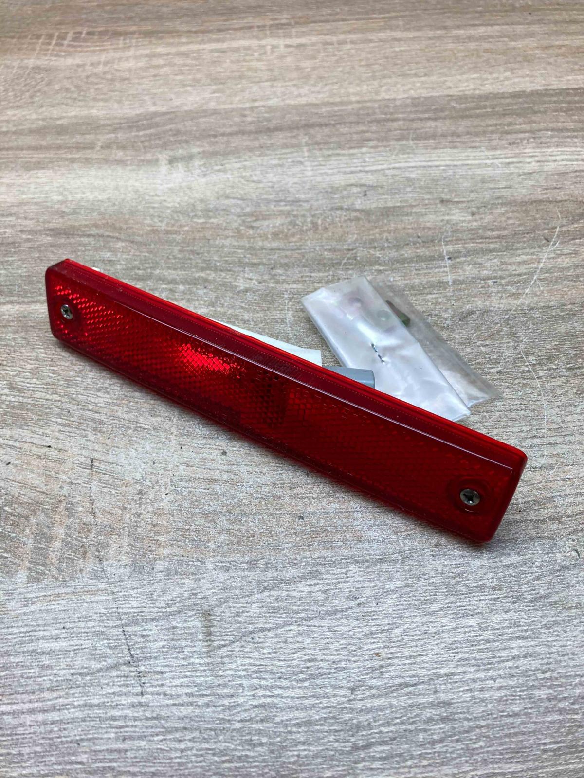 1134 203   Front reflector Mitsubishi Lancer