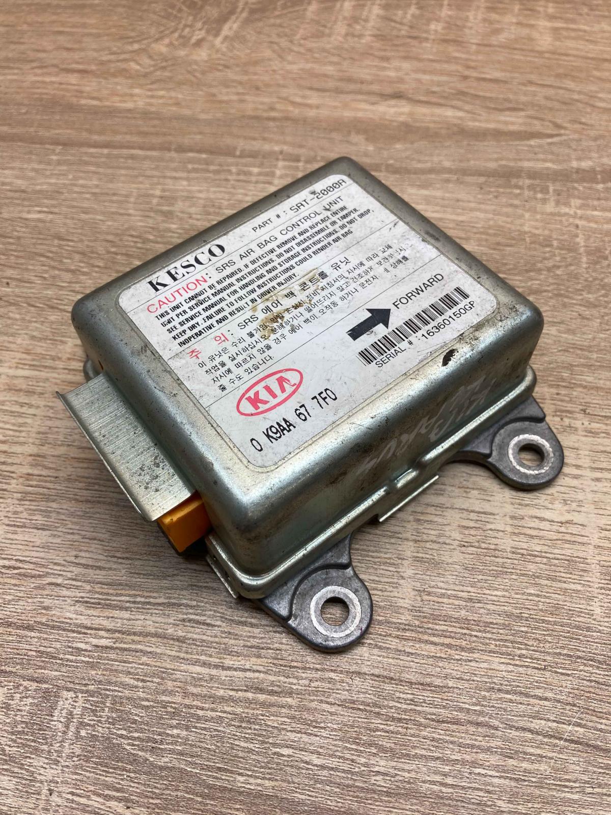 0K9AA677F0   Airbag control unit/module KIA Clarus