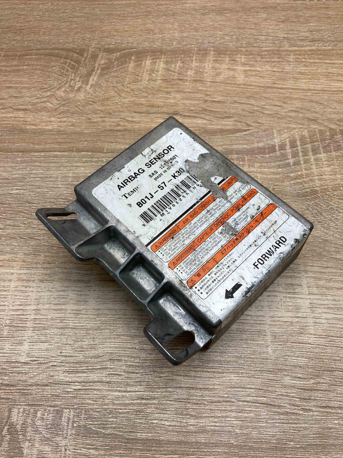 B01J 57 K30   Airbag control unit/module Mazda 323