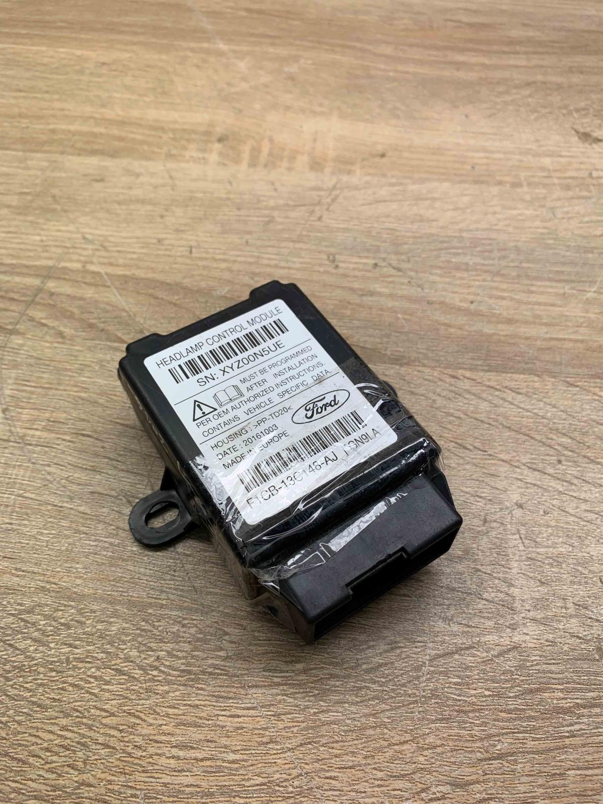 F1CB 13C148 AJ   Light module LCM Ford Focus