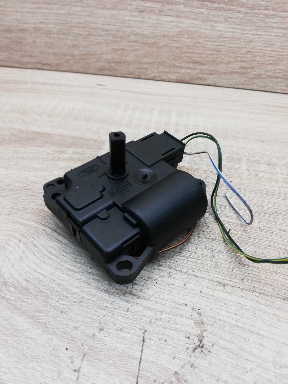 XS4H 19E616 AC C22892  Air flap motor/actuator Ford Focus