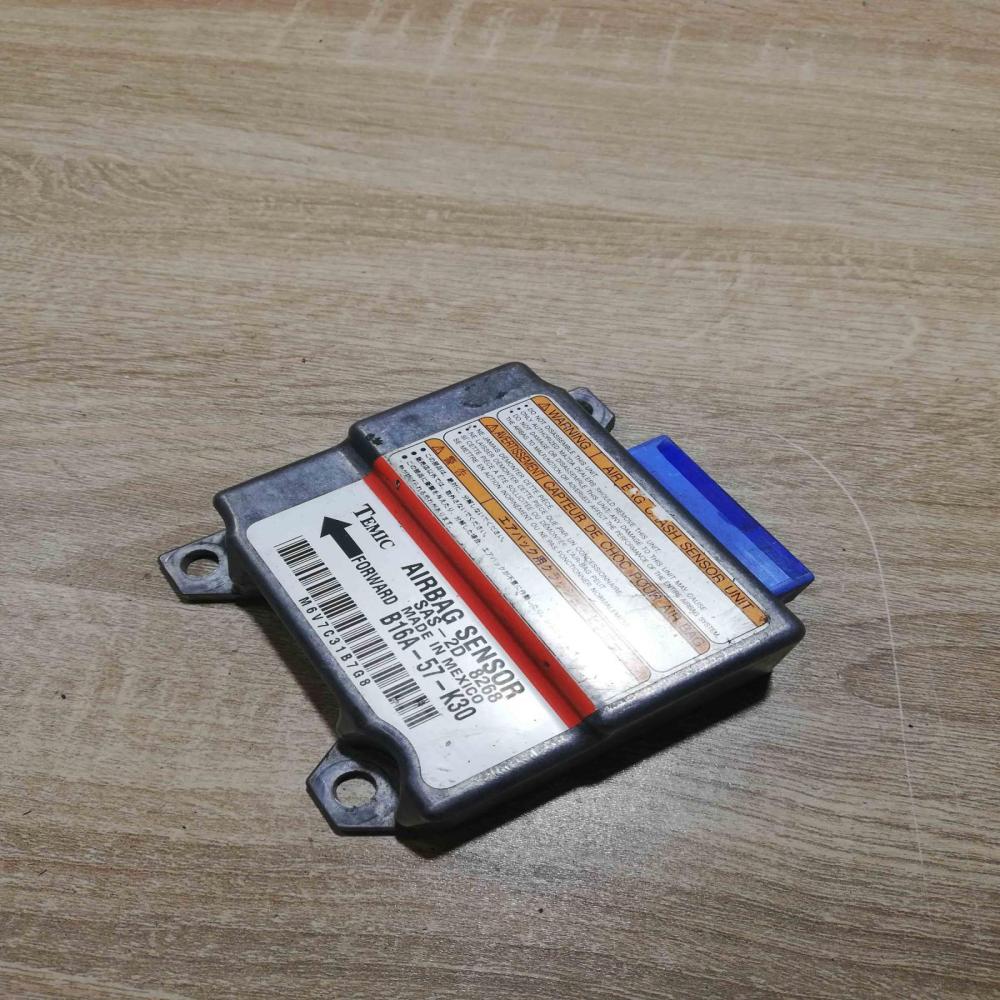 B16A 57 K30   Airbag control unit/module Mazda 323 F