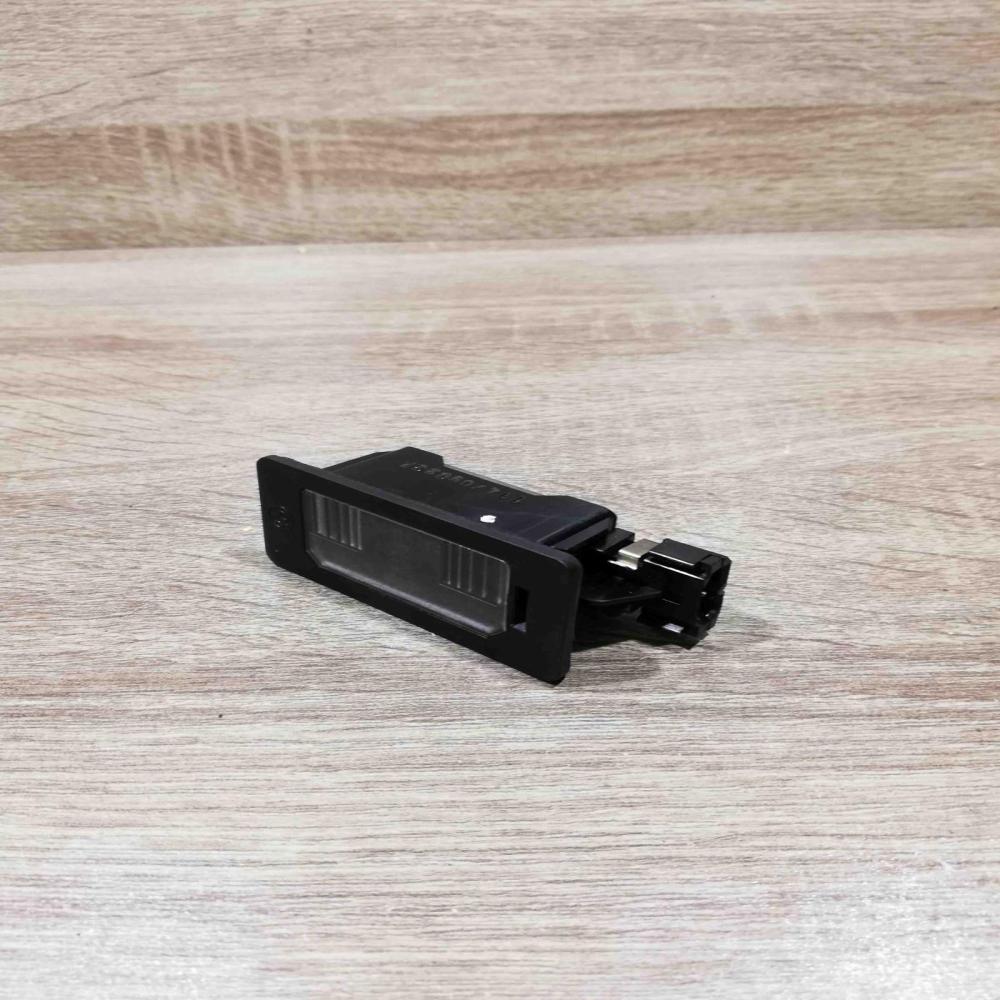 7176934 04   Number plate light BMW X5 E70