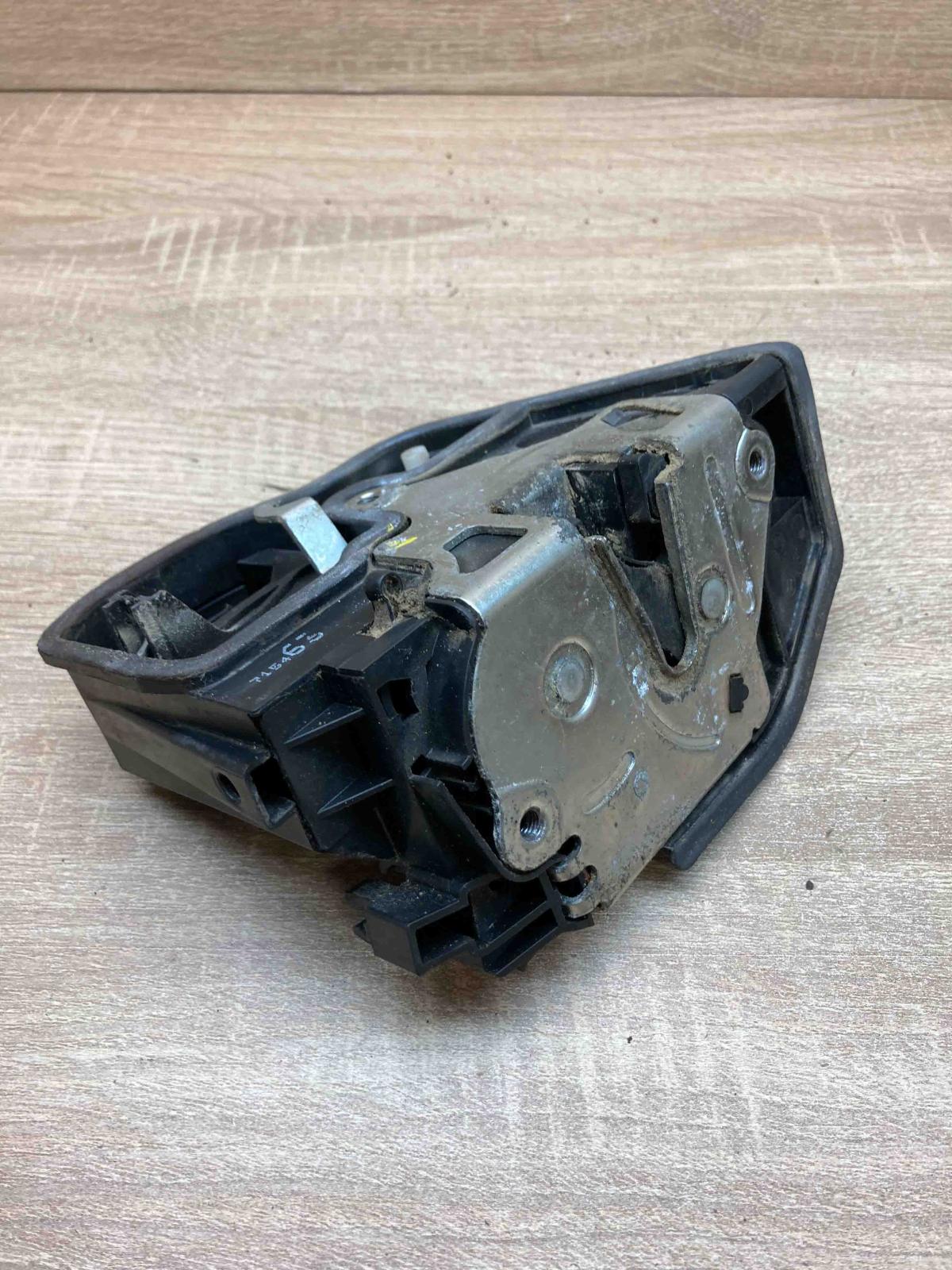7154630   Rear door lock BMW 5 E60 E61