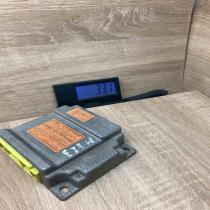 B25B57K30A   Airbag control unit/module Mazda 323 F