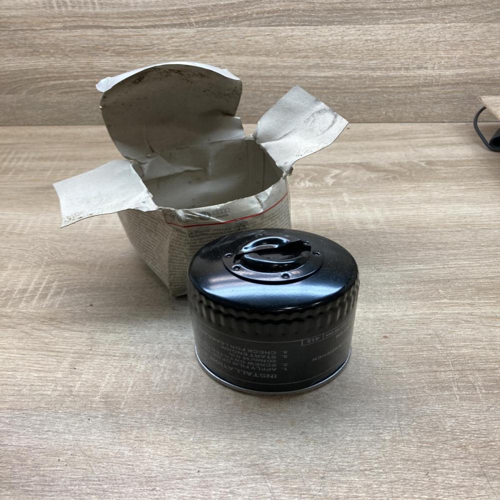 030115561C   Oil filter cover Volkswagen Polo III 6N 6N2 6NF