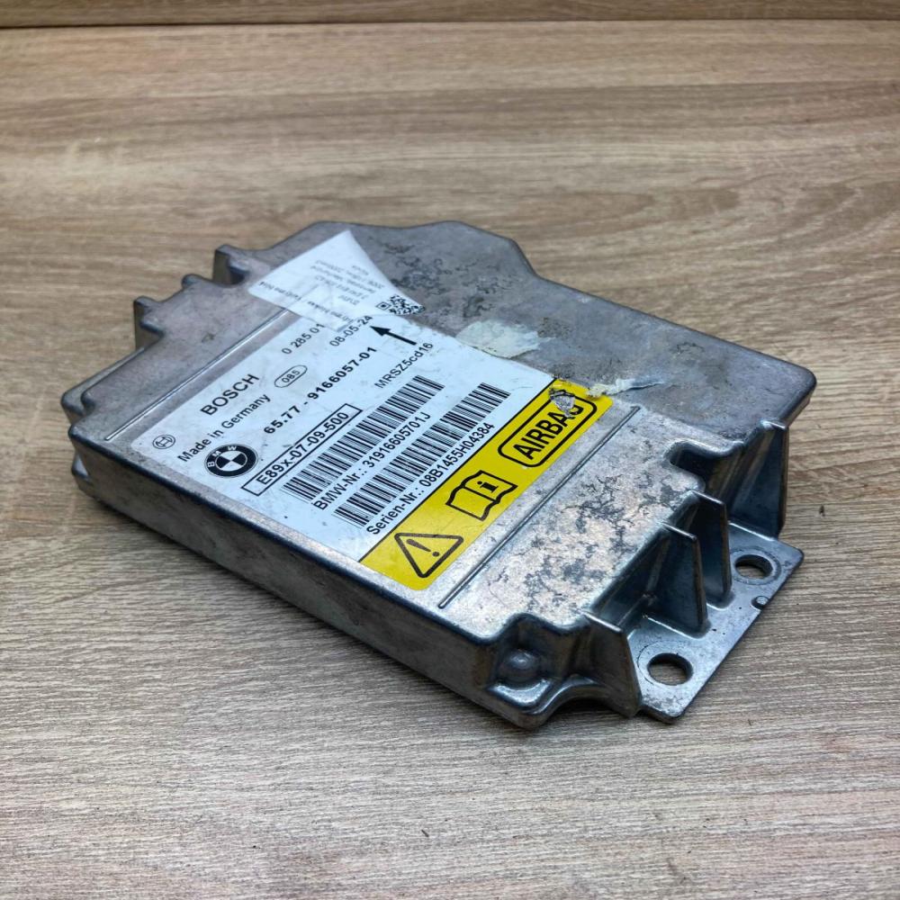 9166057   Airbag control unit/module BMW 1 E81 E87