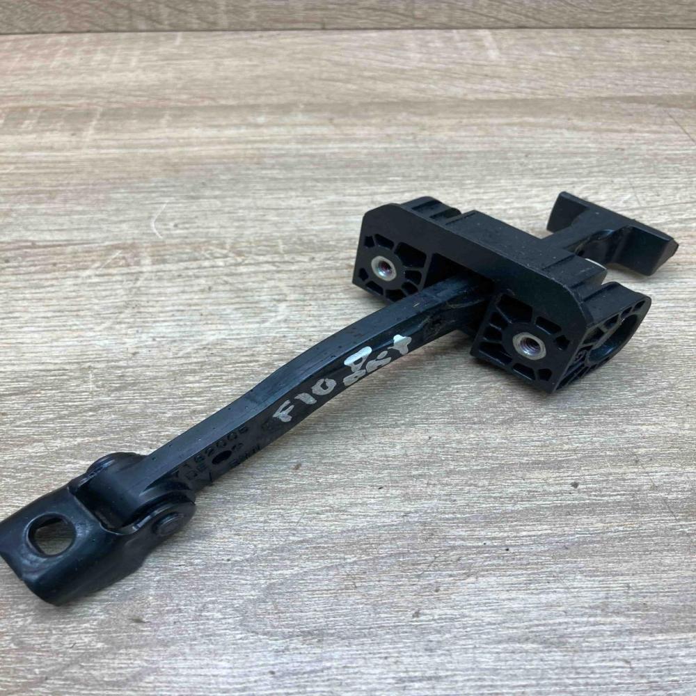 7182005   Front door check strap stopper BMW 5 F10 F11