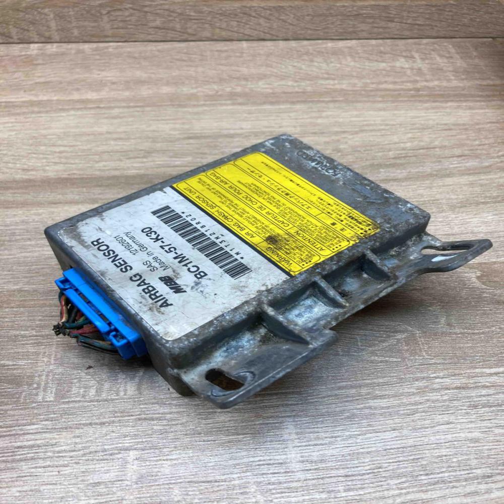 BC1M 57 K30 12192601  Airbag control unit/module Mazda 323