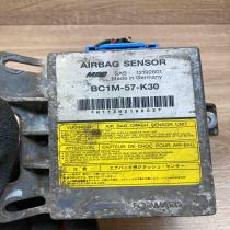 BC1M 57 K30 12192601  Airbag control unit/module Mazda 323