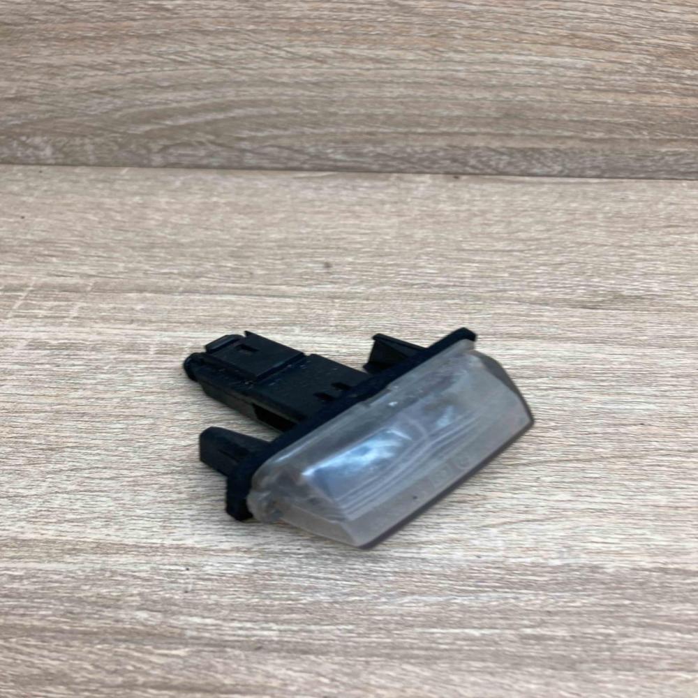 0507R CML 02 107  Number plate light Toyota Yaris