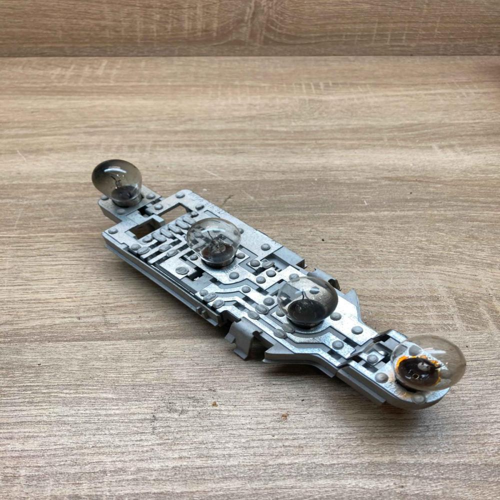 6918927   Tail light bulb cover holder BMW 3 E46