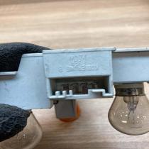 6928381   Tail light bulb cover holder BMW 3 E46