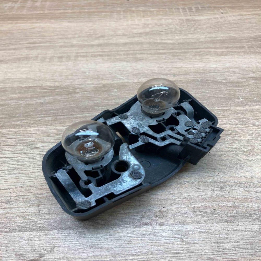 8374807 230573L  Tail light bulb cover holder BMW 3 E46