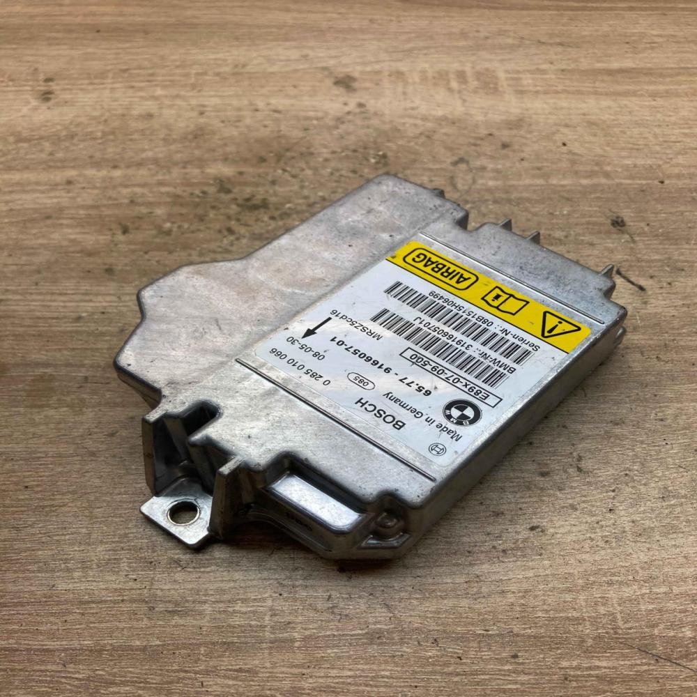 9166057 MRSZ5CD16  Airbag control unit/module BMW 3 E90 E91