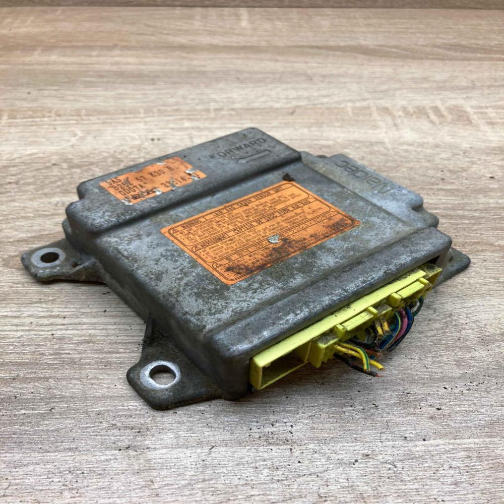 B25E57K30B 0D07A  Airbag control unit/module Mazda 323 F