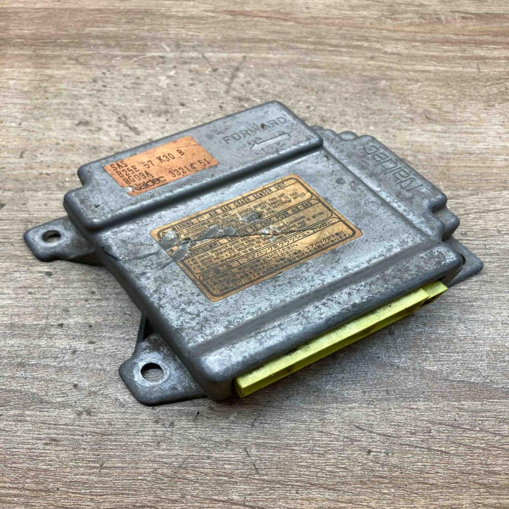 B25E57K30B 8G03A  Airbag control unit/module Mazda 323