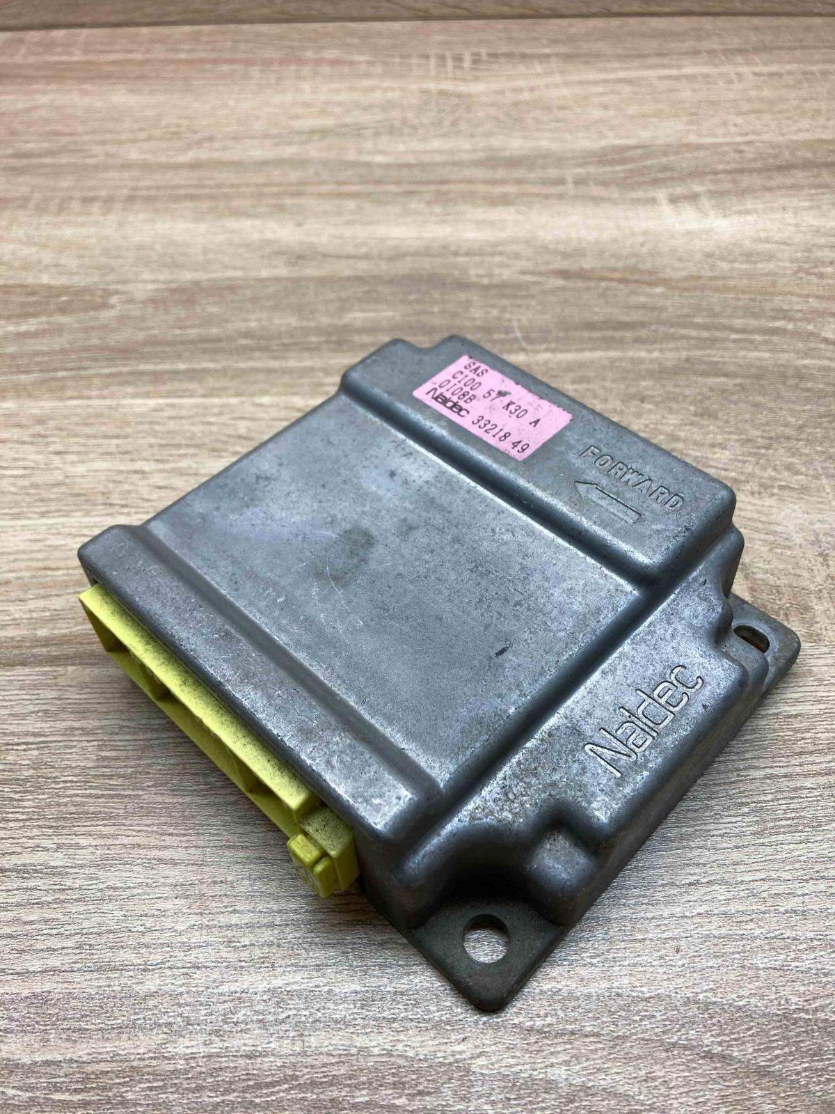 C10057K30A 33218 49  Airbag control unit/module Mazda Premacy