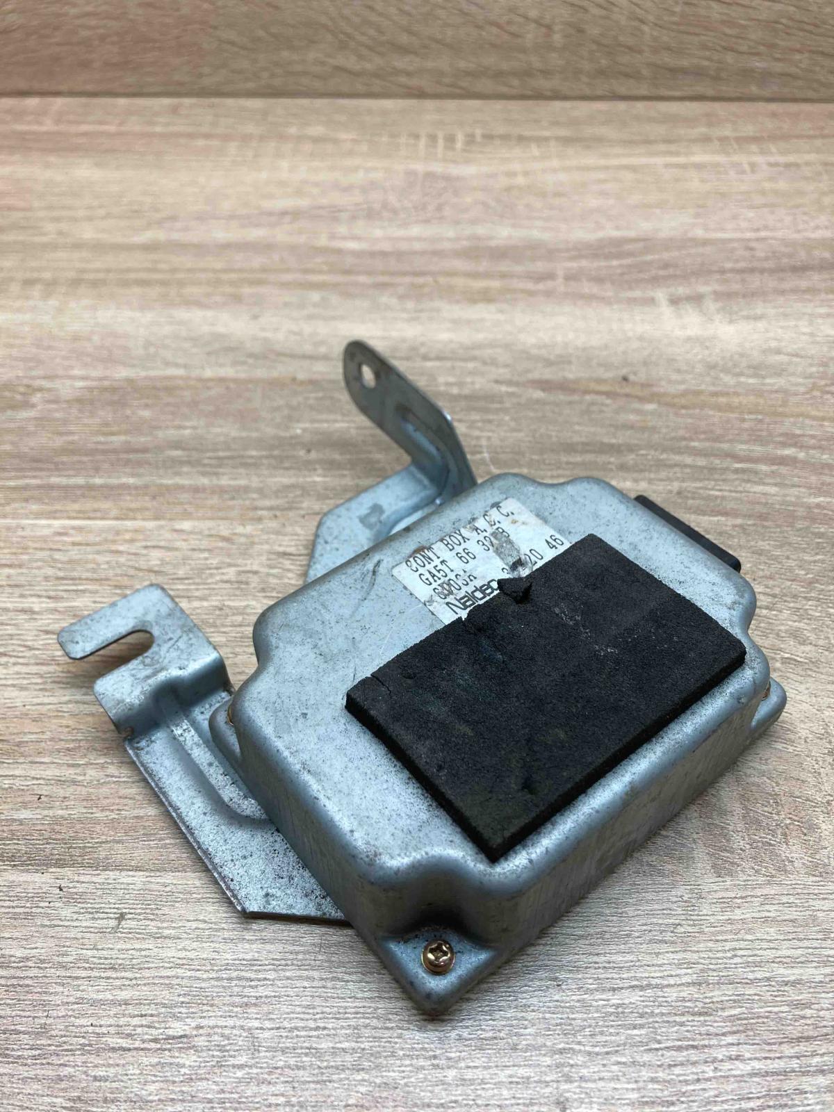 GA5T6632B   Airbag control unit/module Mazda 323