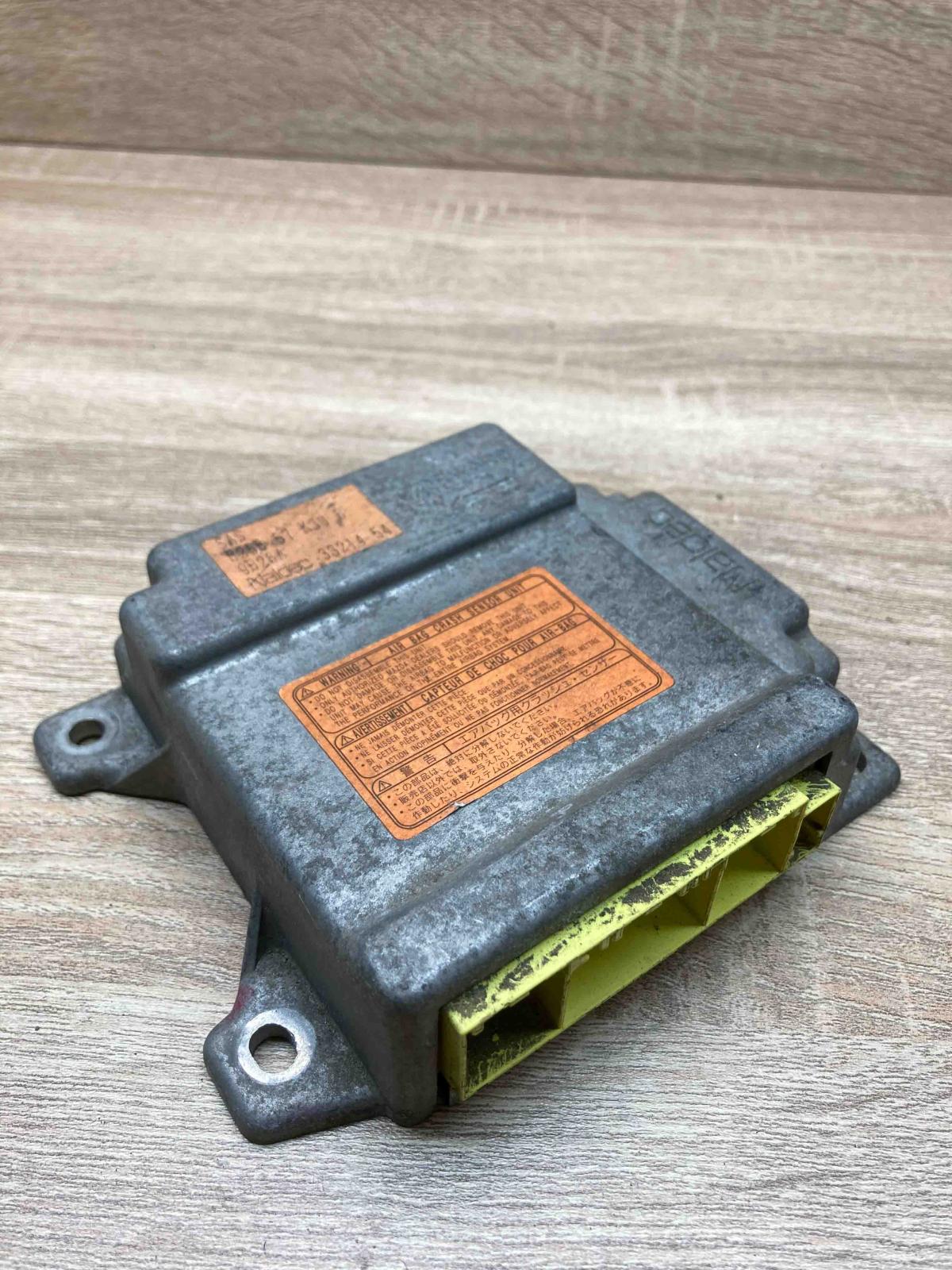 B25E57K30B   Airbag control unit/module Mazda 323 F
