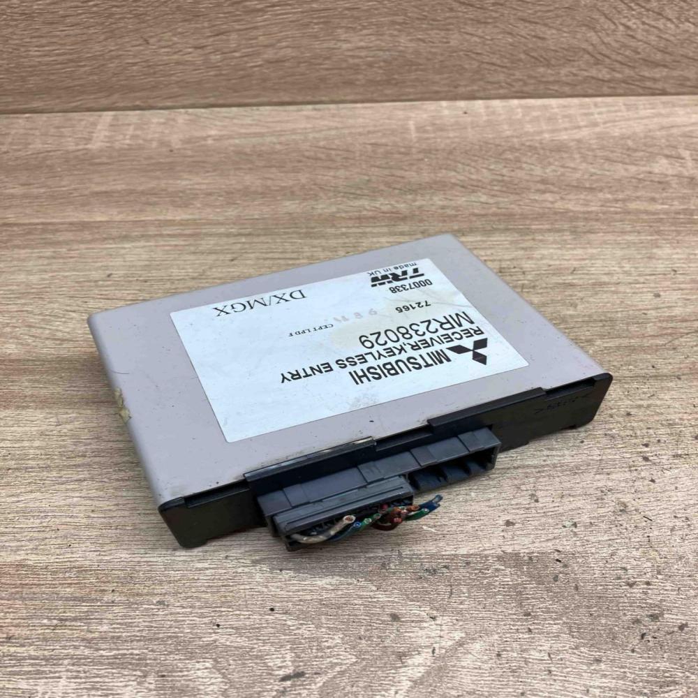 MR238029 0007338  Comfort/convenience module Mitsubishi Carisma