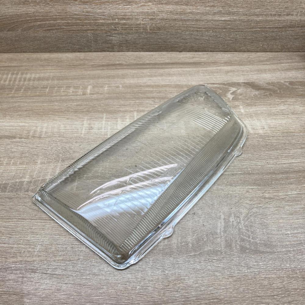 0013010404   Headlight lense Peugeot 306