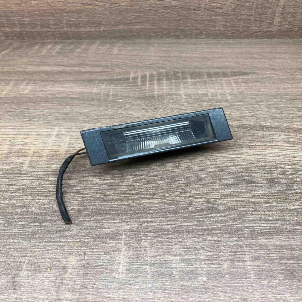 6913913   Number plate light BMW 1 E81 E87