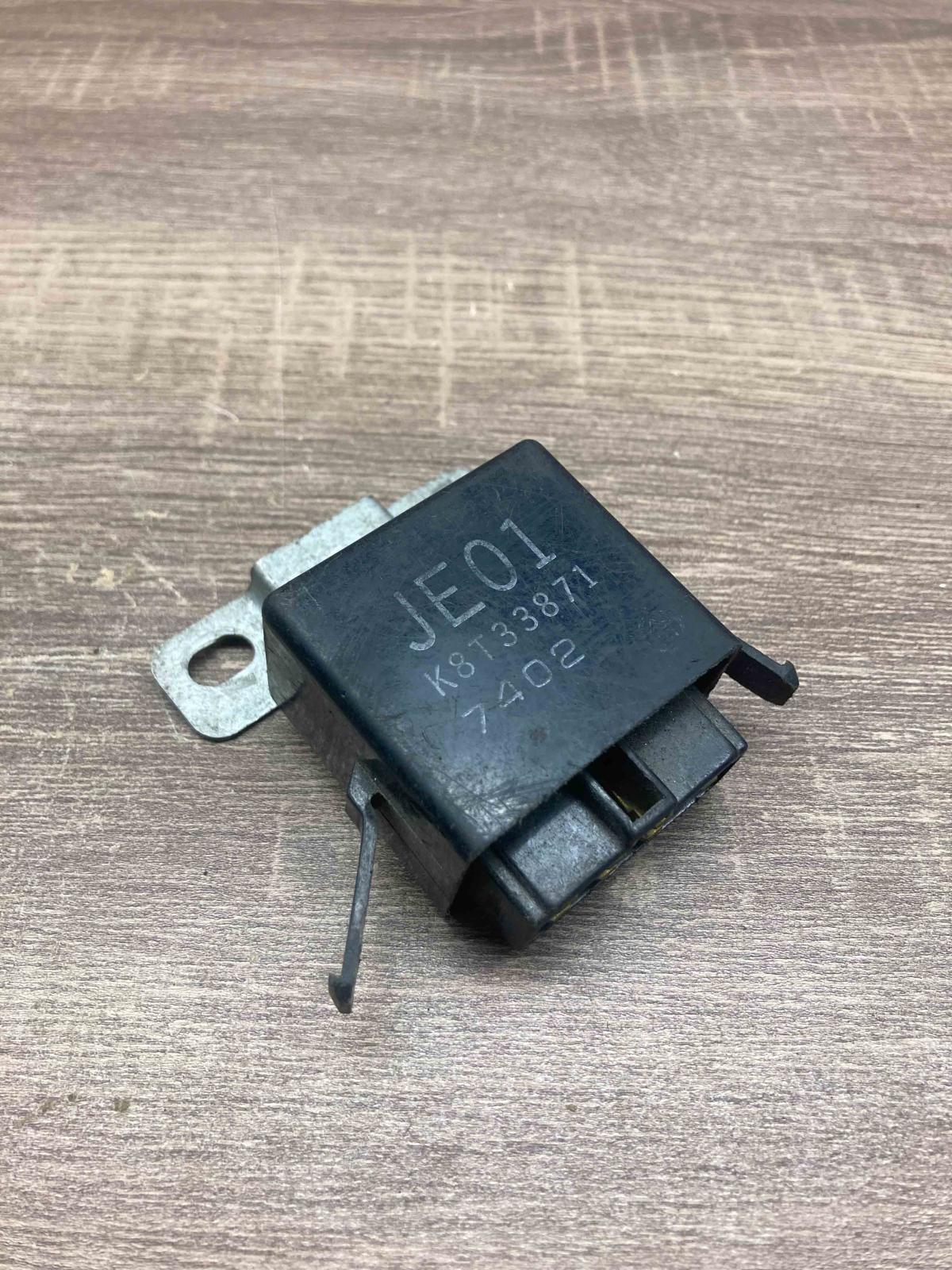 K8T33871 JE01 7402 Other relay Mazda 626