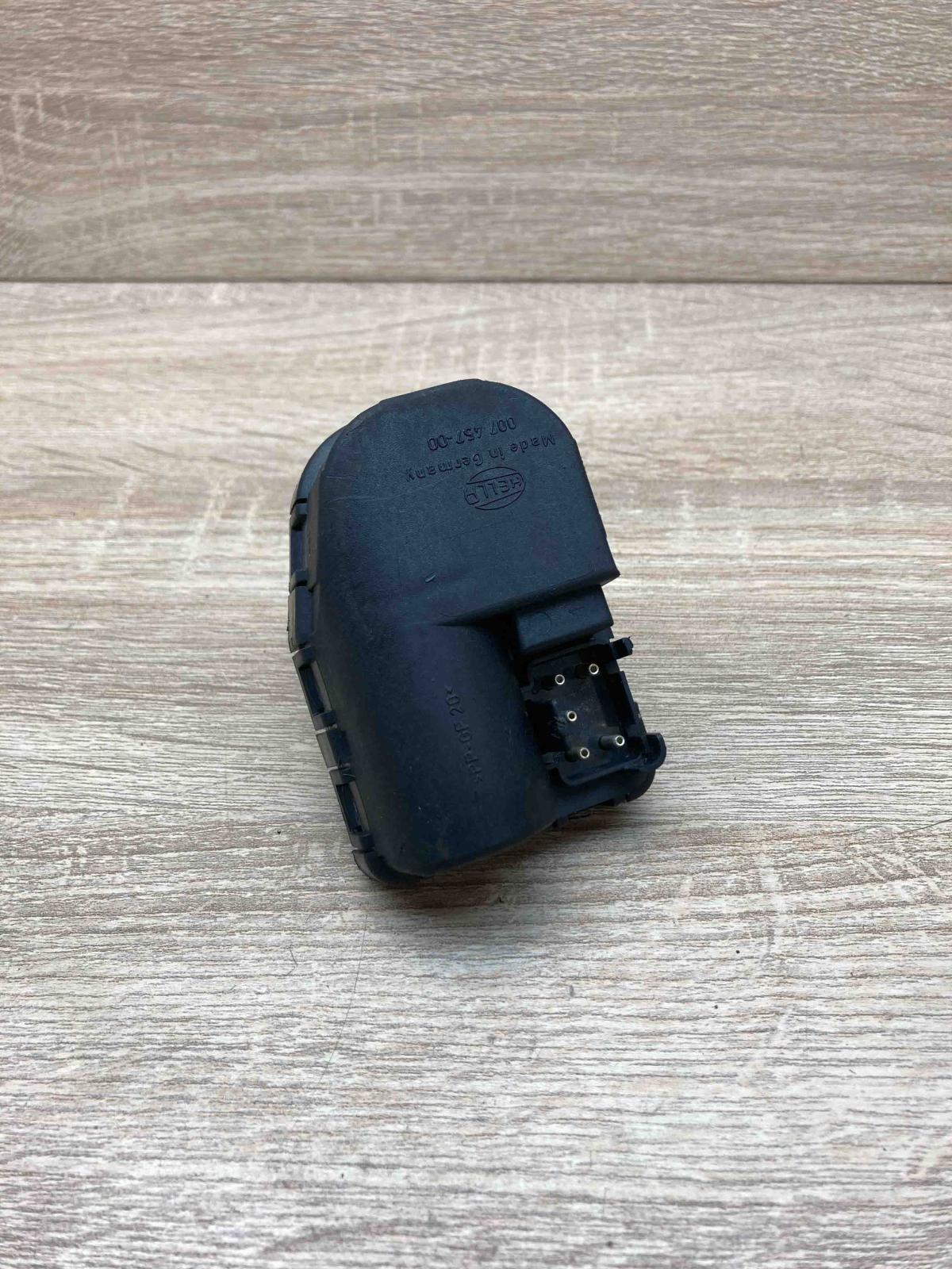 007457 00   Headlight level adjustment motor Mercedes-Benz E W210