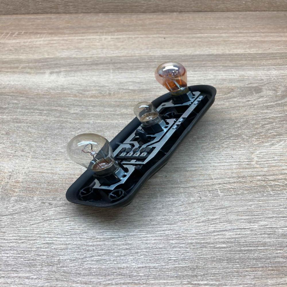 2496339   Tail light bulb cover holder BMW 5 E39