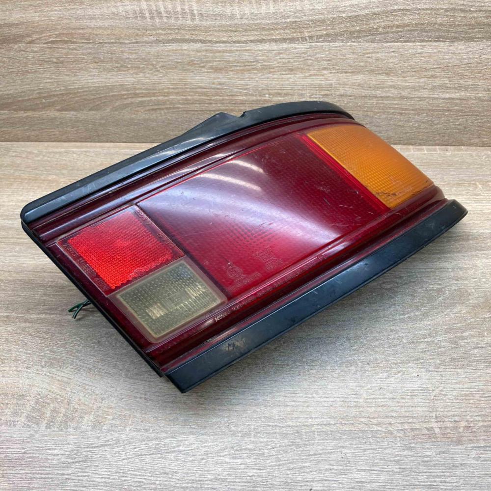 220 61301  RH Tailgate rear/tail lights Mazda 323