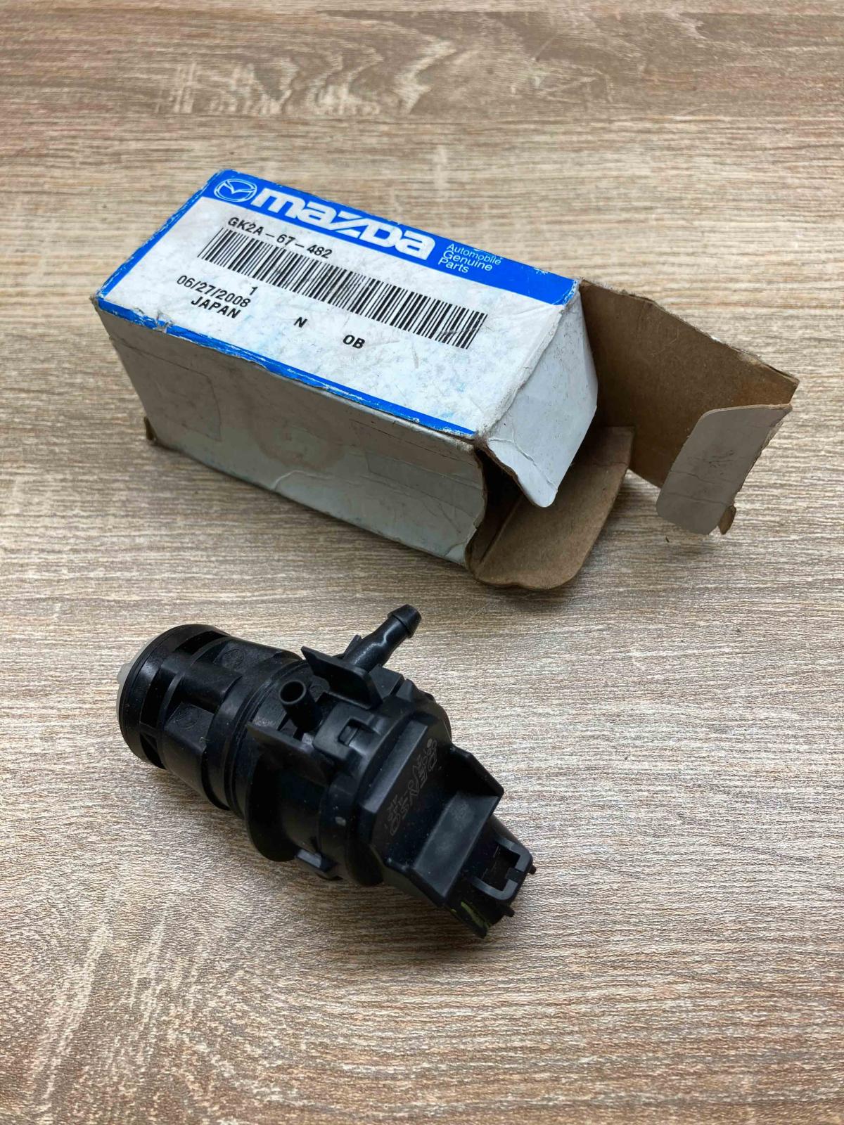 GK2A 67 482 060210 4461  Windscreen/windshield washer pump Mazda 6