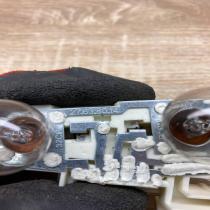6937474   Tail light bulb cover holder BMW 3 E90 E91