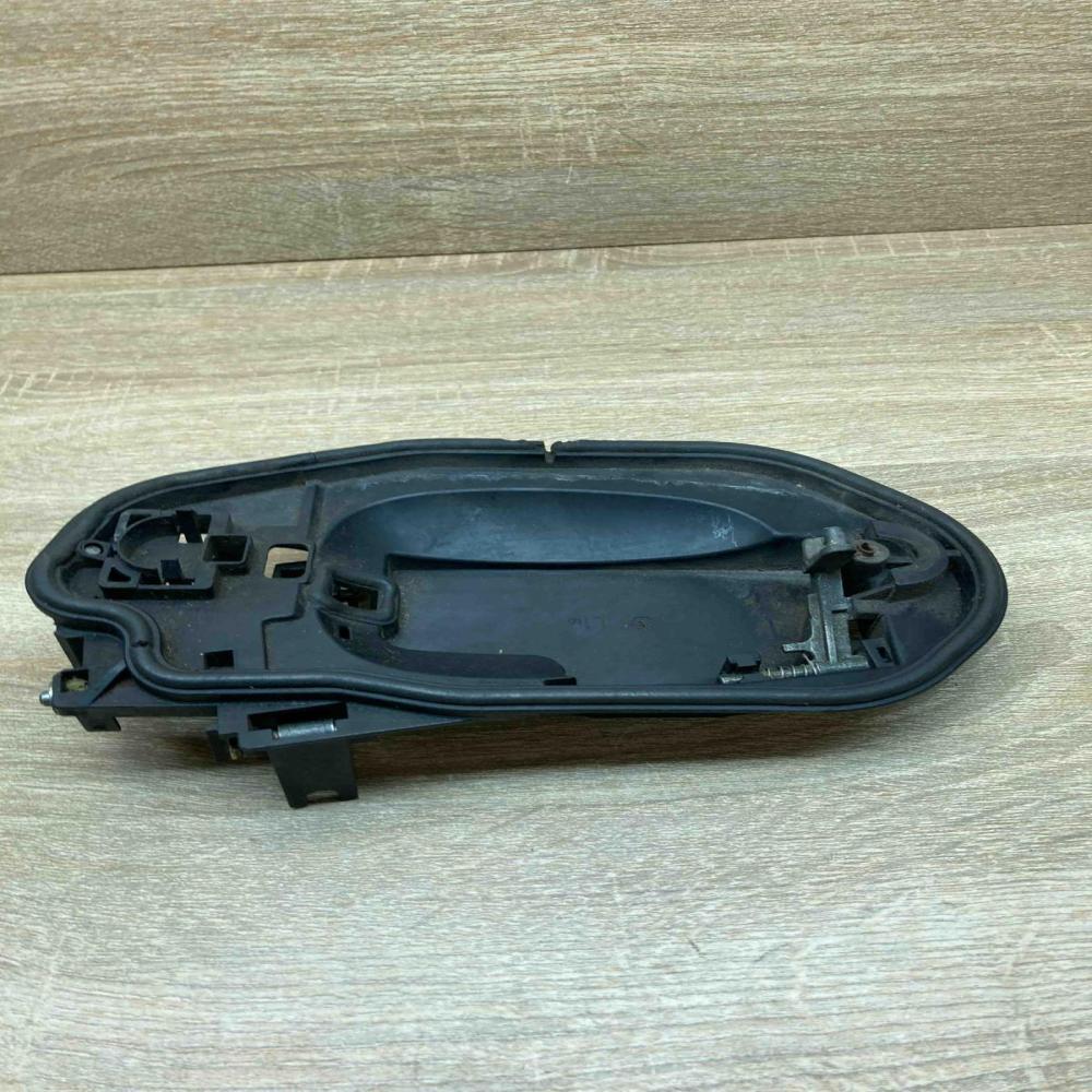 7034543   Rear door exterior handle/bracket BMW 5 E60 E61