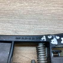 8253453   Front door exterior handle/bracket BMW 3 E46