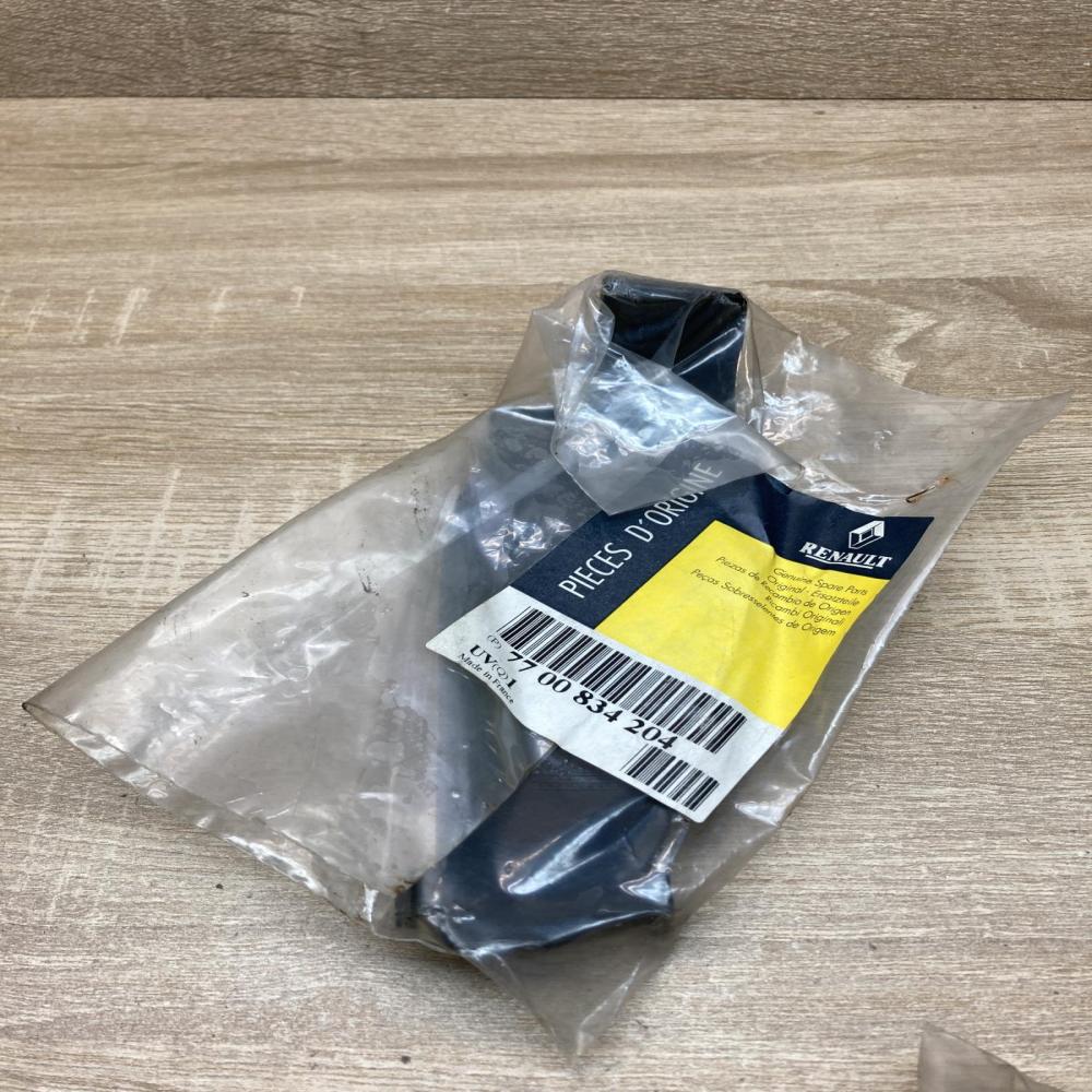 7700834204   Fog light bracket Renault Megane I