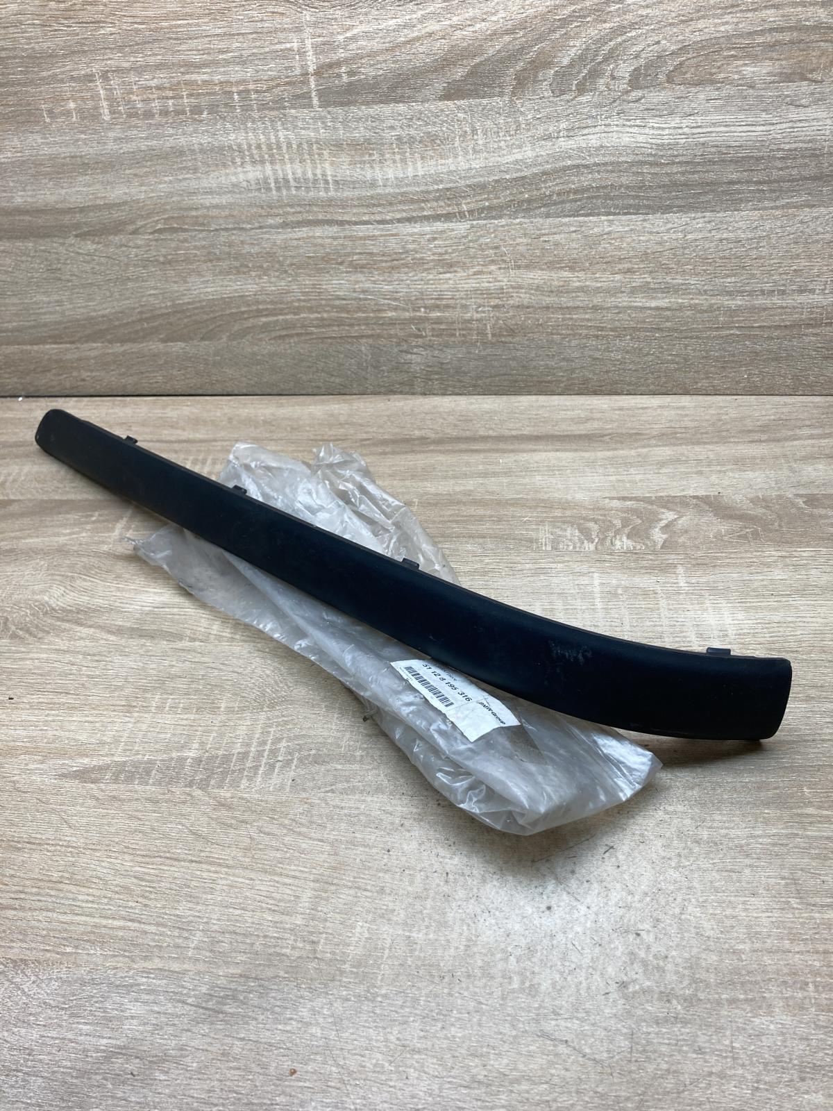 8195316   Rear bumper trim bar molding BMW 3 E46