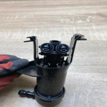 28642EM30A 2033190109 Left side Headlight washer spray nozzle Nissan Tiida C11