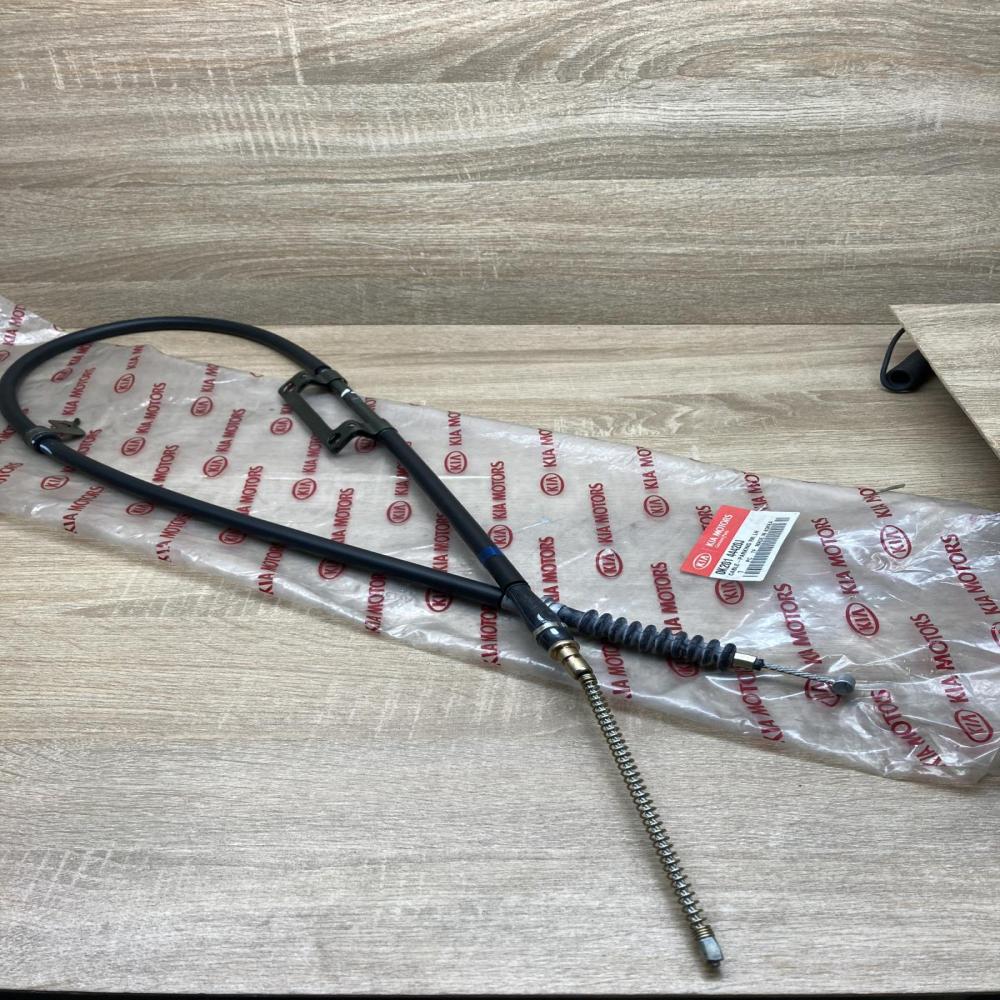0K201 44420J   Hand brake release cable KIA Sephia