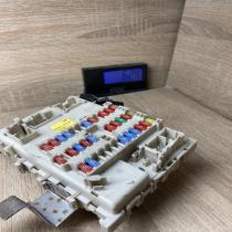 24350 BU210   Fuse module Nissan Almera Tino