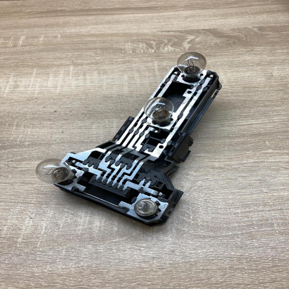 3B9945257   Tail light bulb cover holder Volkswagen PASSAT B5