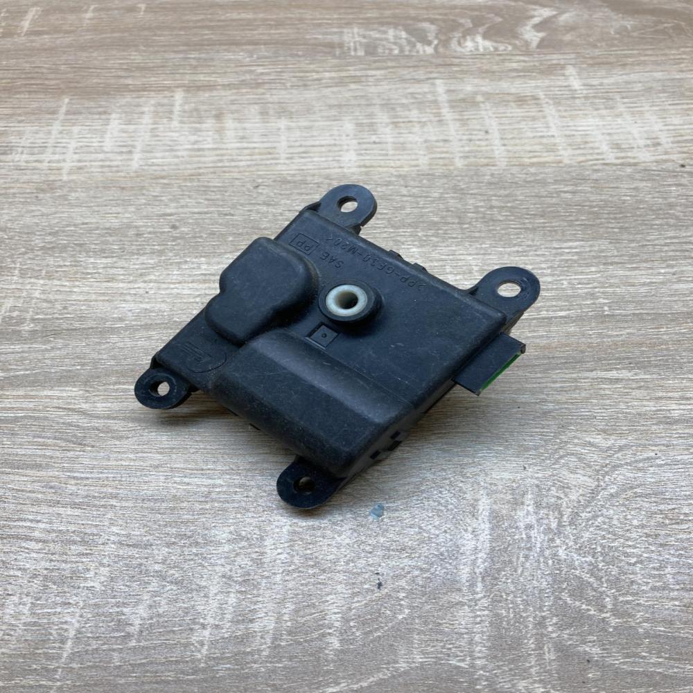 23980 30820   Air flap motor/actuator Nissan Primera