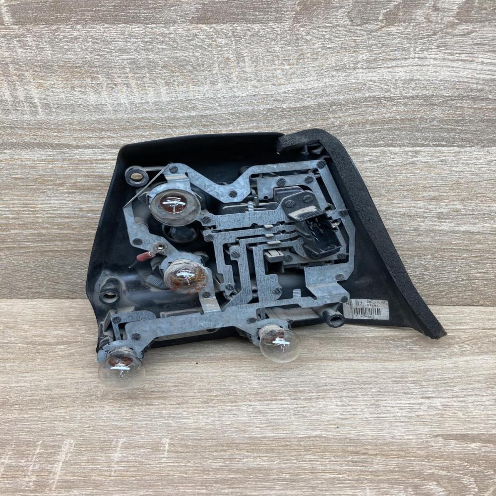 8383099 230043  Tail light bulb cover holder BMW 3 E46